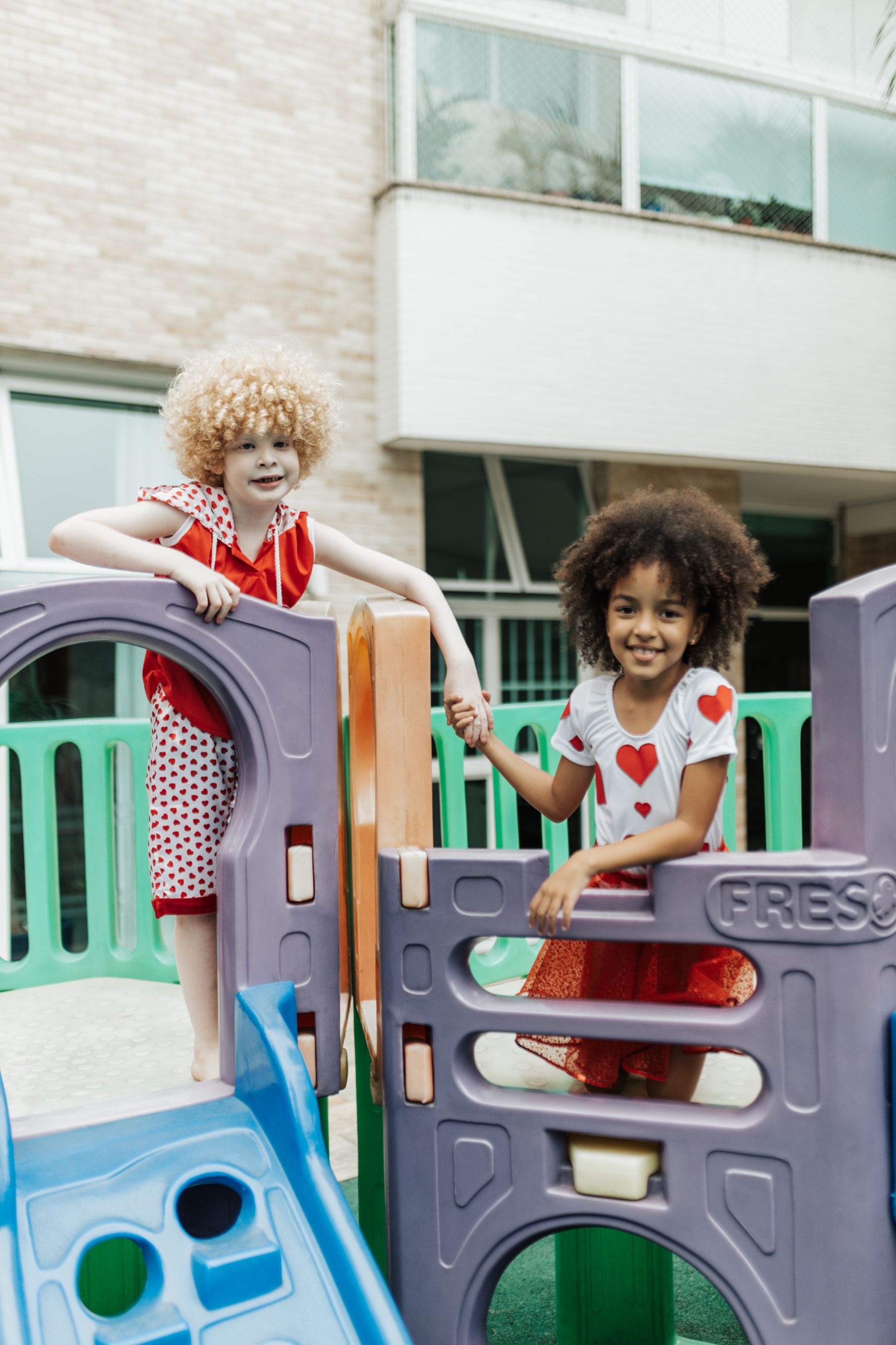 Children enjoying active play together on a playground